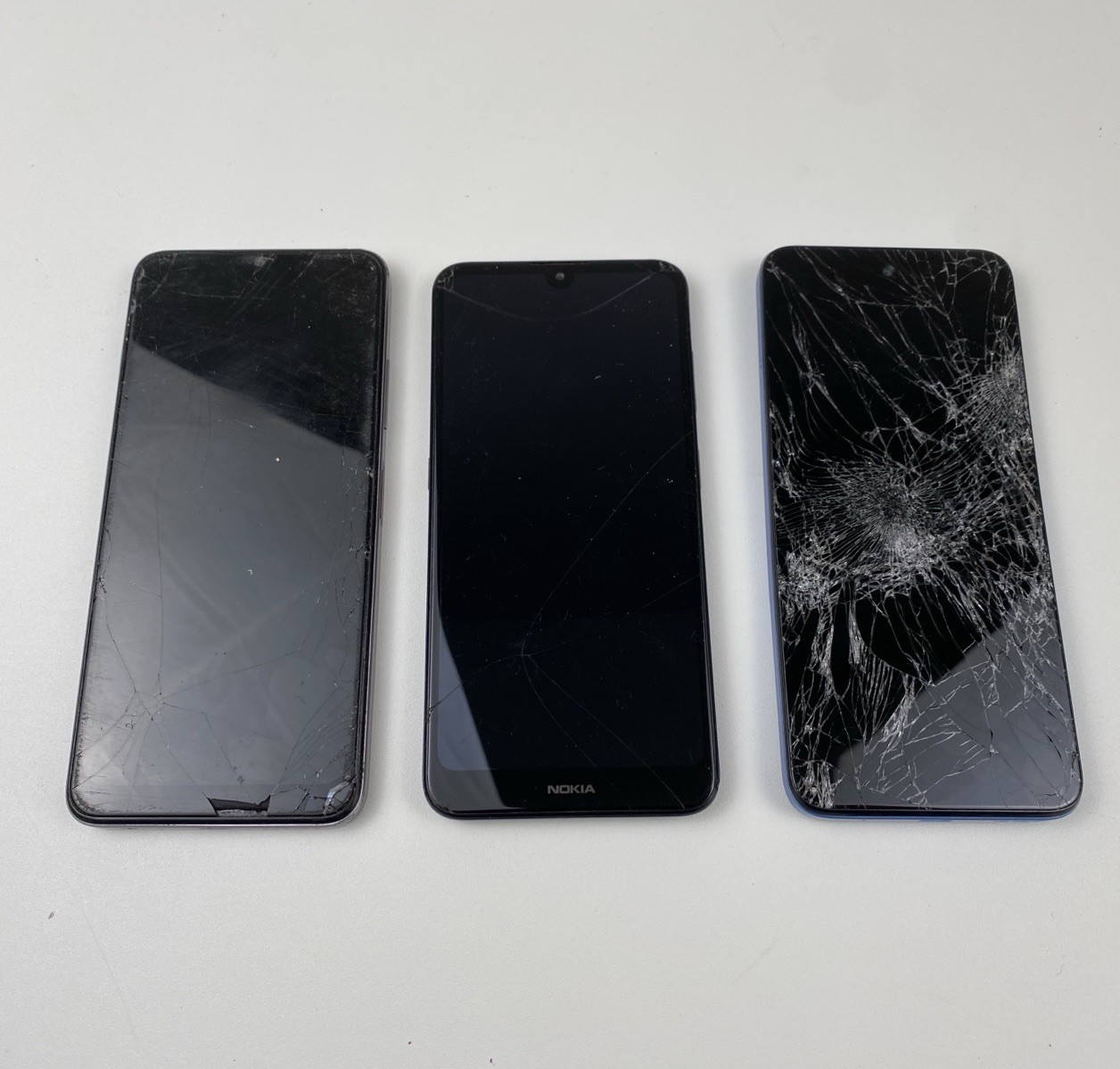 Lot of 3 BROKEN Smartphones NOT WORKING AS IS UNTESTED Nokia Motorolla T-mobile