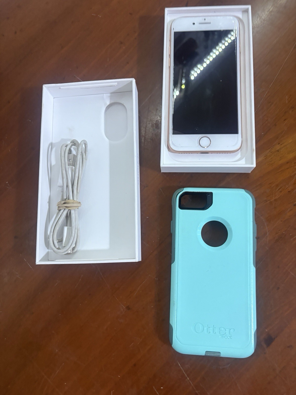 iphone 8 -64gb Pink unlocked With Teal Otter Box