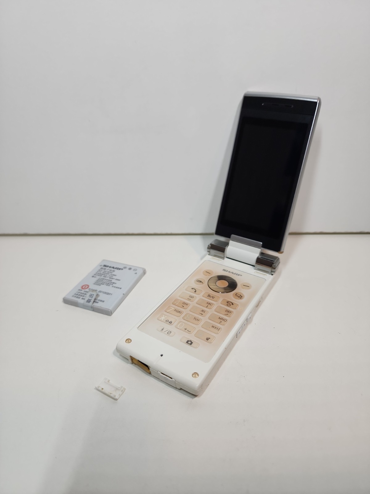 SHARP AQUOS WHITE SH-7118C Android Flip Phone Used Needs New Battery
