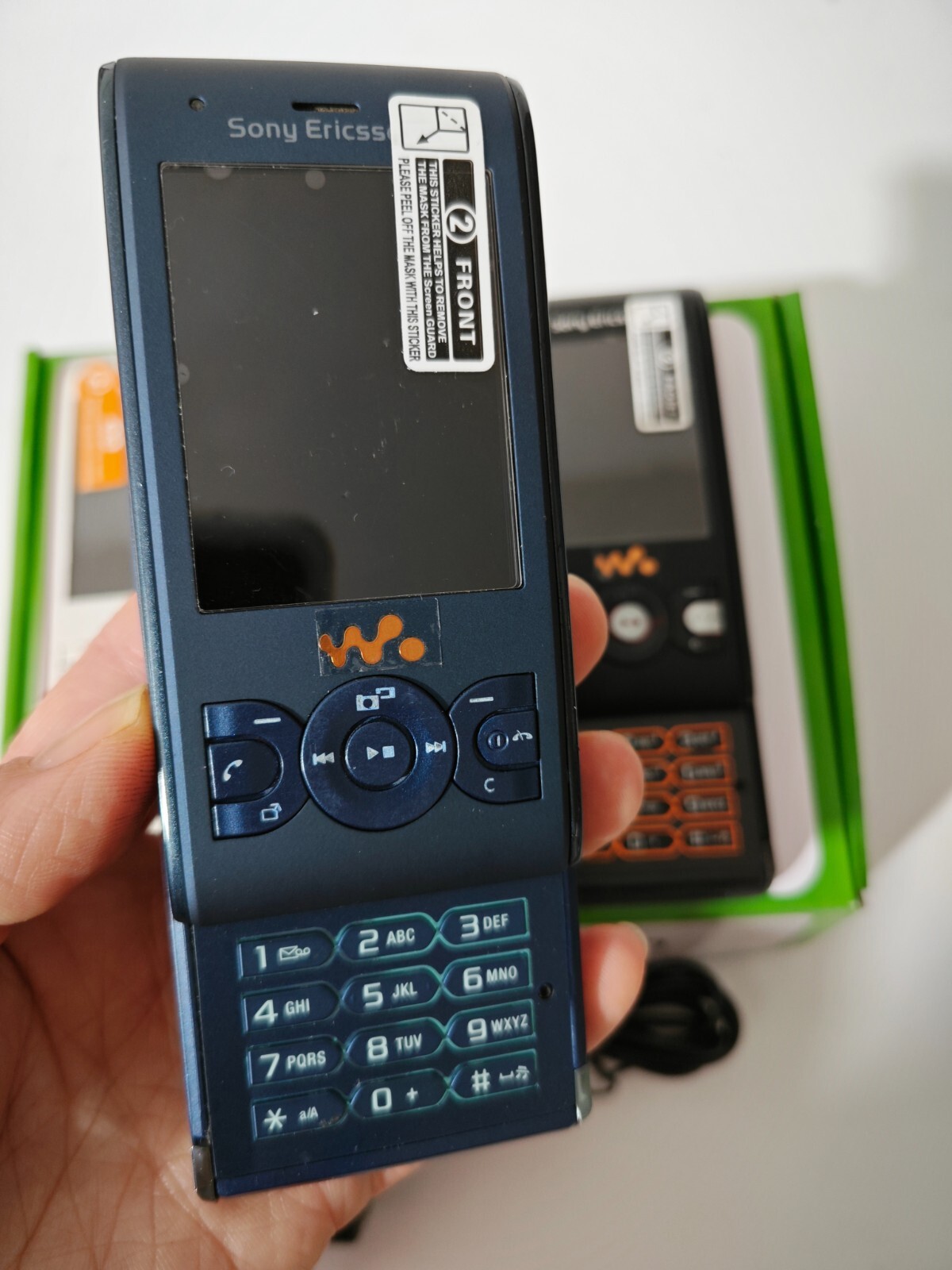 Sony Ericcson Walkman W595 – Black blue white (Unlocked) Cellular Phone