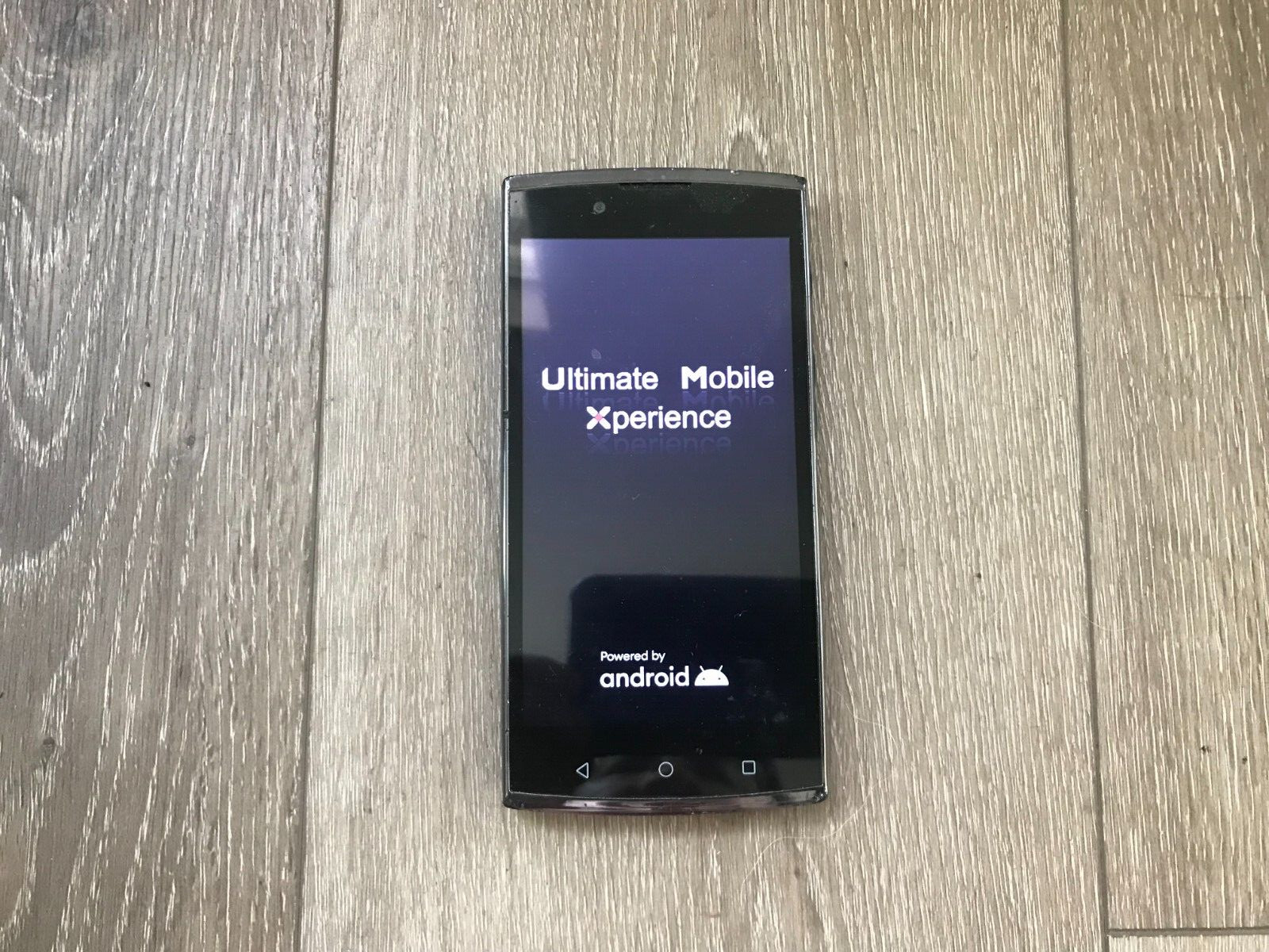 UniMax UMX U693CL Android Wireless Smart Phone Powers on FOR PARTS OR REPAIR