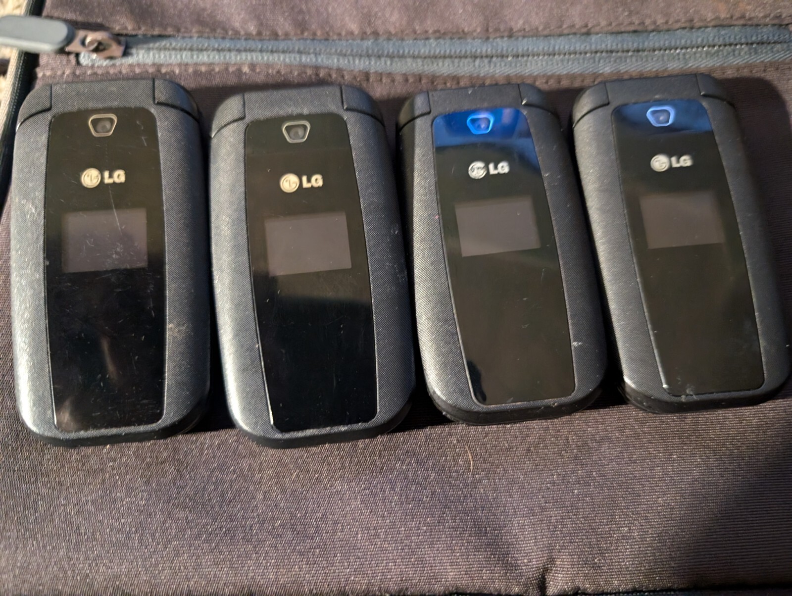 Lot Of 4 LG 440g Trac phones All Turn On Please Read
