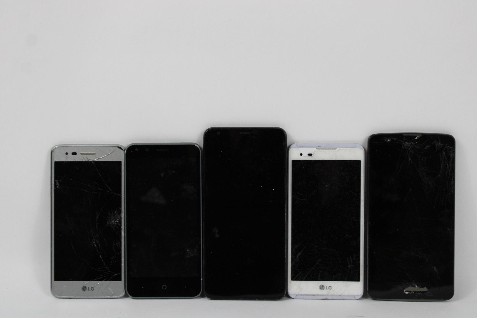 Lot of 5 LG Smart Phones – All Broken Untested Missing Parts As Is No Returns