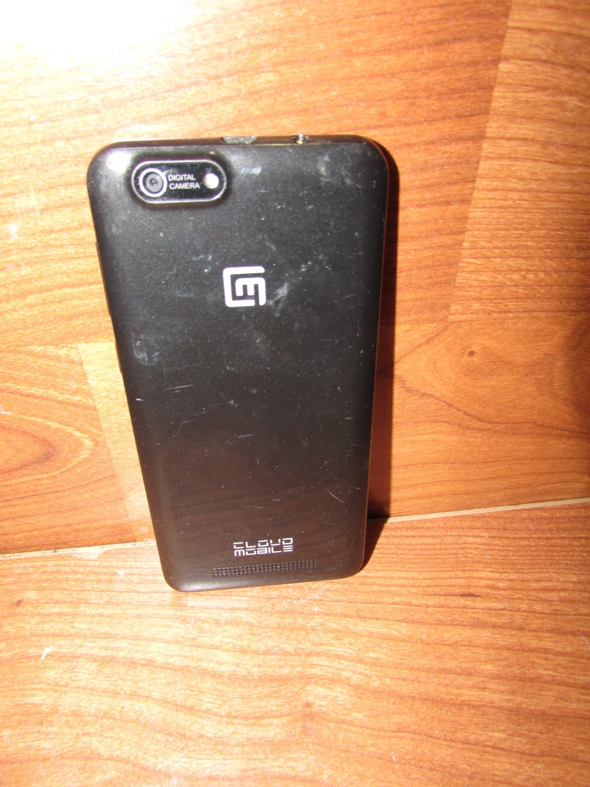 Cloud Mobile touchscreen android CM smartphone for parts or repair.